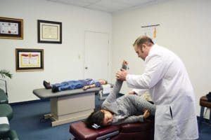 Chiropractor 77095 TX Scott William Stelmach Adjusting Child
